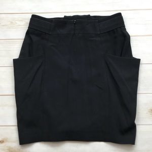 BCBGMaxAzria Skirts - BCBG MAXAZRIA black mini skirt size XS bow front BCBGMaxAzria Skirts - BCBG MAXAZRIA black mini skirt size XS bow front